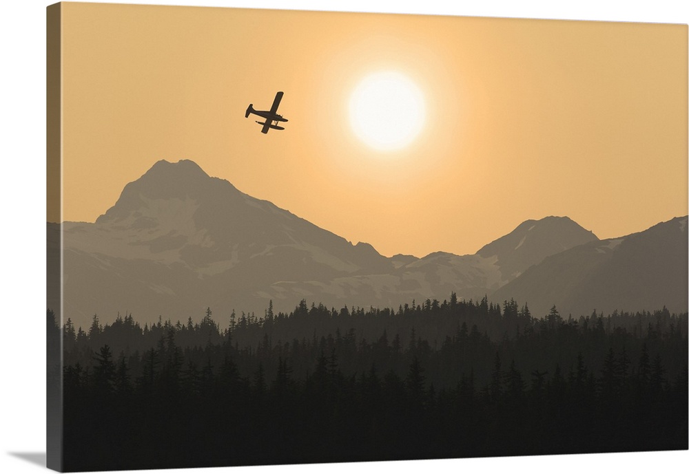 Silhouette Of A Floatplane In Flight Over The Chilkat Mountains At Sunset, Tongass National Forest, Alaska