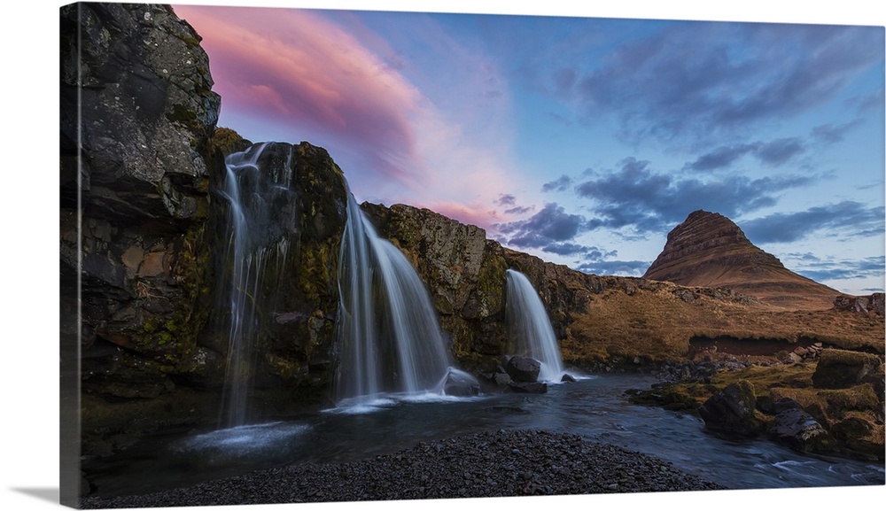 Small Waterfall With Kirkjufell In The Distance And Clouds Lit By The Rising Sun, Snaefellsnes Peninsula, Iceland
