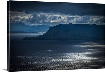 Small Yacht Sailing Past Eigg Island In The Scottish Inner Hebrides, Scotland