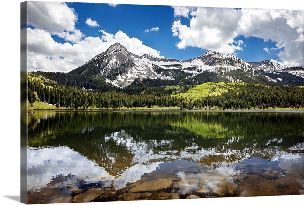 Snowcapped East Beckwith mountain in the background reflected in Lost Lake Slough; Colorado, United States of America