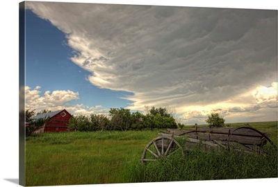 Storm Clouds Gather Over An Abandoned Farm, Saskatchewan, Canada
