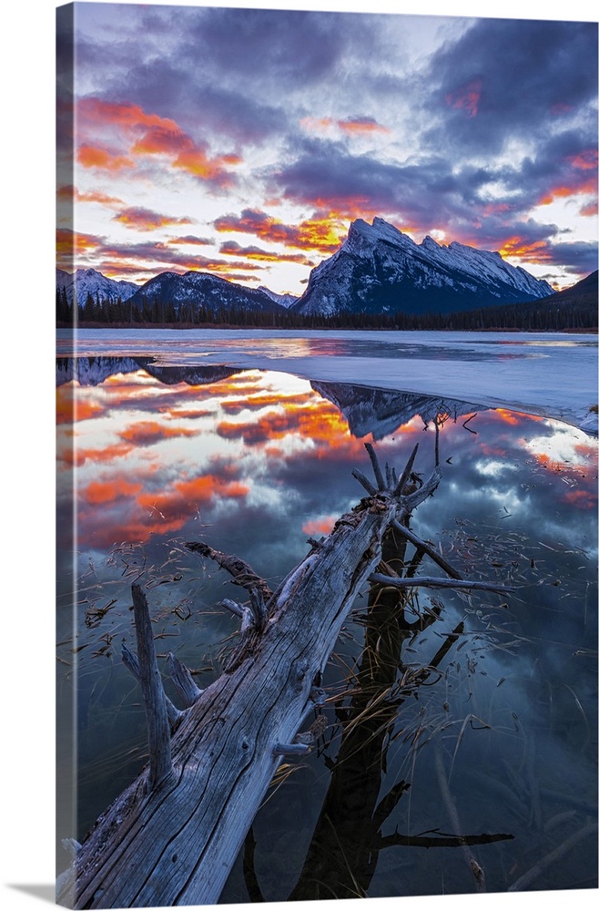Stunning sunrise at Vermillion Lakes backed by Mt. Rundle.
