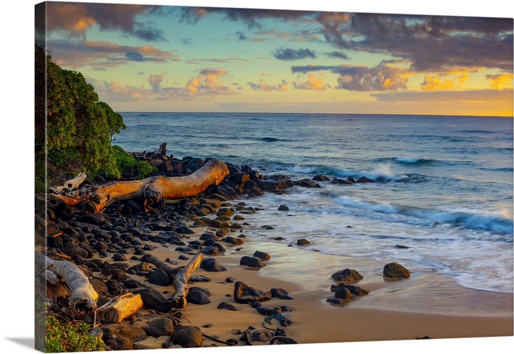 Sunrise over beach and ocean; Kauai, Hawaii, United States of America