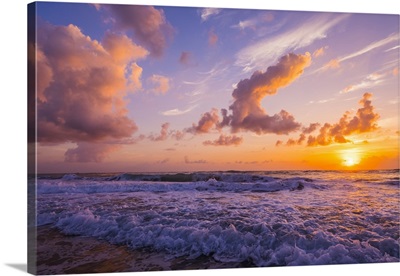 Sunrise over the Atlantic Ocean with the surf washing on the shore; Indialantic, Florida