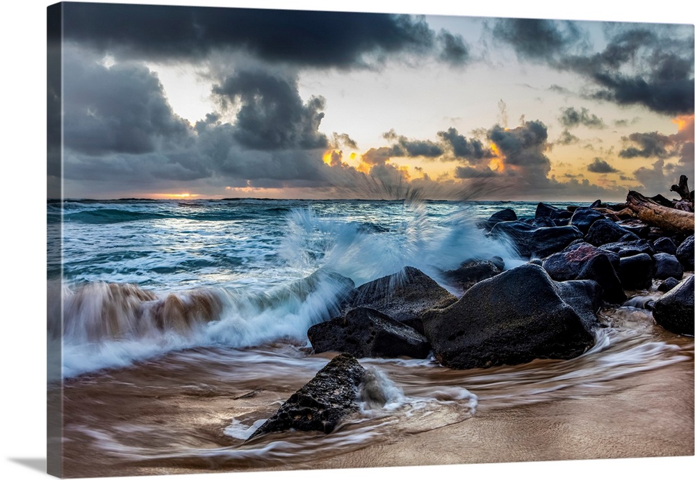 Sunrise through the clouds over the Pacific Ocean, viewed from Lydgate beach, Kapaa, Kauai, Hawaii, united states of America.