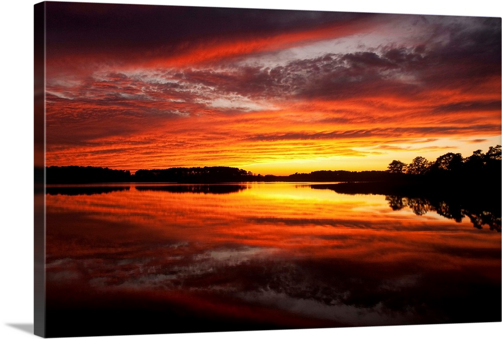 Sunset over a Chesapeake Bay shoreline.