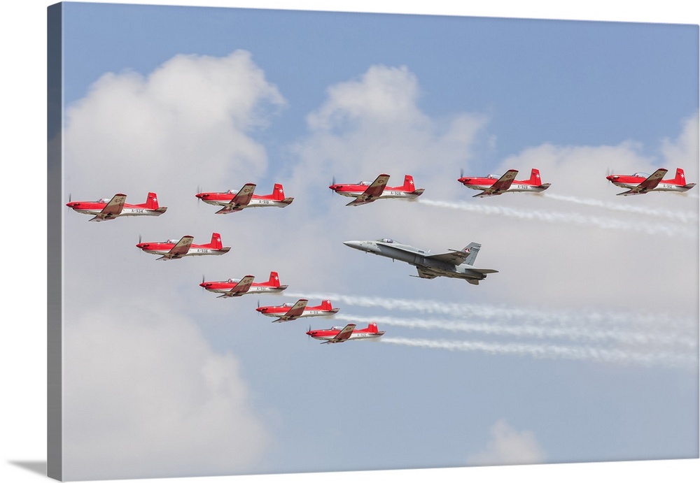 Swiss Air Force F/A-18C Hornet and PC-7 Aerobatic display team.