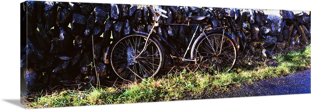 The Burren, County Clare, Ireland, Bicycle Leaning Against Stone Wall