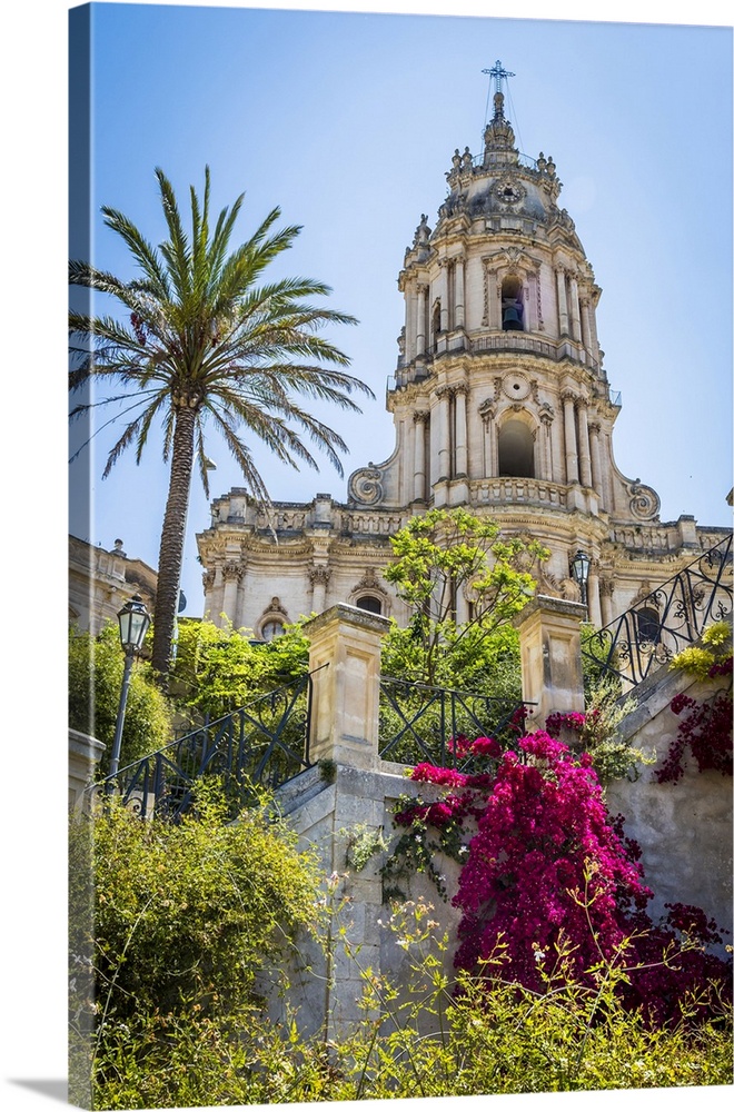 The dome of the baroque Cathedral of San Giorgio with gardens in historical Modica in the Provnice of Ragusa in Sicily, Italy