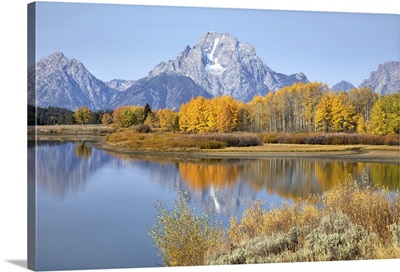 The Grand Tetons Reflecting Fall Colors In The Snake River, Wyoming
