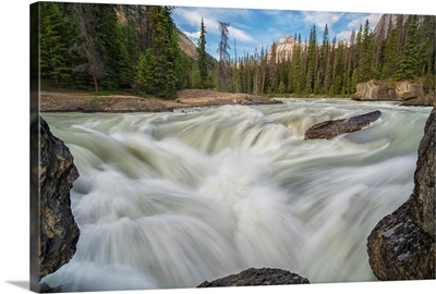 The Kicking Horse River flows over a waterfall, Yoho National Park, Canada