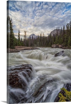 The Kicking Horse River flows over a waterfall, Yoho National Park, Canada