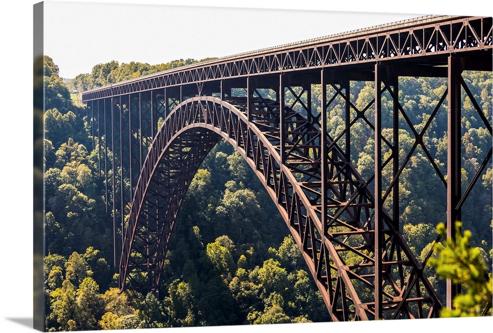 The New River Gorge Bridge is a steel arch bridge 3,030 feet long over the New River Gorge near Fayetteville, in the Appal...