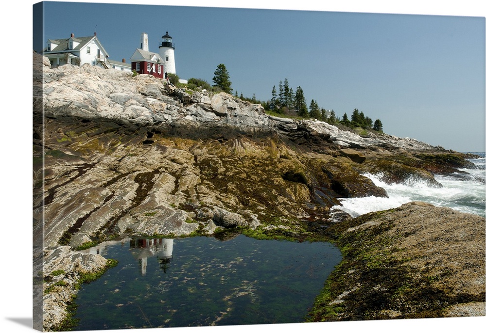 The Pemaquid lighthouse and its reflection in a coastal tidal pool, Pemaquid Point, Maine.