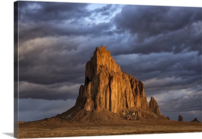 The Rising Sun Illuminates This Sacred Rock Of Navajo People, Shiprock, New Mexico