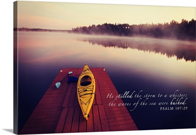 Tranquil Lake And Fog With A Kayak On A Wooden Dock And Scripture From Psalm 107:29
