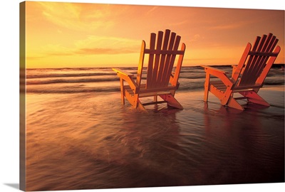 Two Muskoka Chairs In The Surf At Grand Beach, Manitoba, Canada