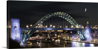 Tyne Bridge illuminated at nighttime over River Tyne, Newcastle, England