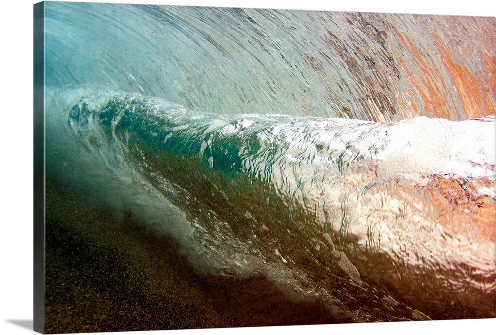Underwater view of a breaking wave, Hawaii, United States of America.