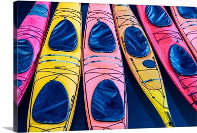 View of colorful kayaks tied to the harbor dock in Valdez, Southcentral Alaska, Summer