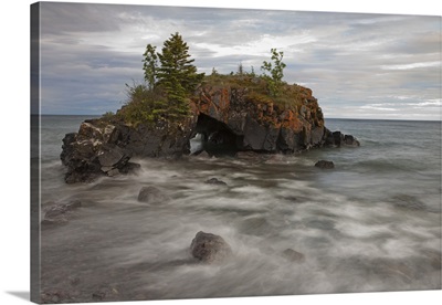 Water Coming Into Shore Around A Rock Formation On Lake Superior; Minnesota, USA