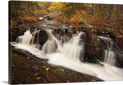 Waterfall on an autumn coloured landscape near Grand Lake; Nova Scotia, Canada