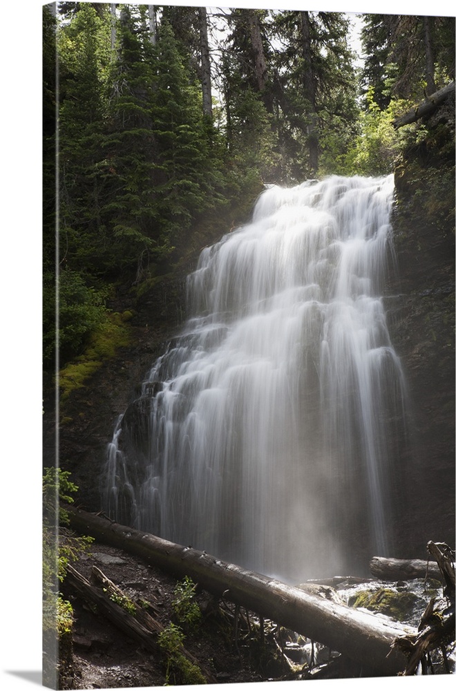 Waterfalls Flowing Down A Rock Cliff; Waterton, Alberta, Canada