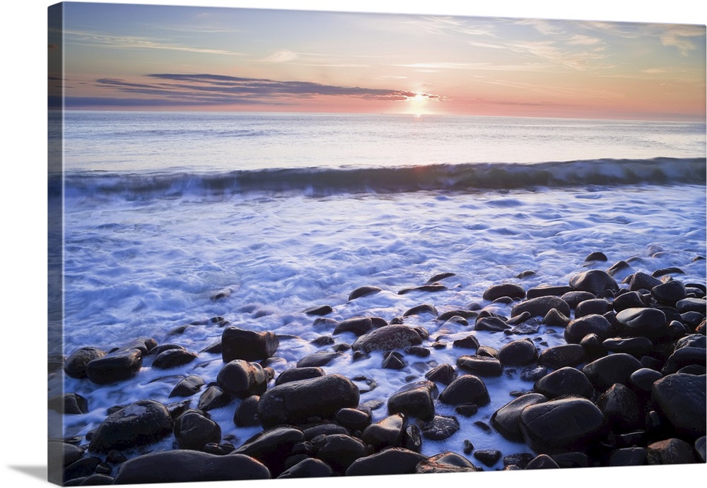Waves Breaking on Rocky Shore at Dawn, Near Dunstanburgh Castle, Northumberland, England