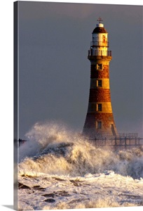 Waves Crashing Against A Lighthouse, Tyne And Wear, England image thumbnail
