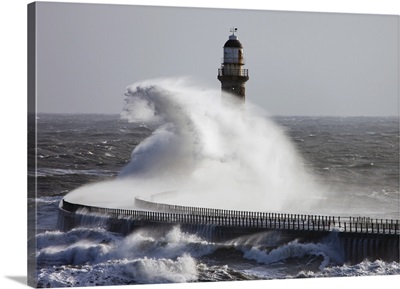 Waves Crashing Into A Pier And Lighthouse, Sunderland, Tyne And Wear, England