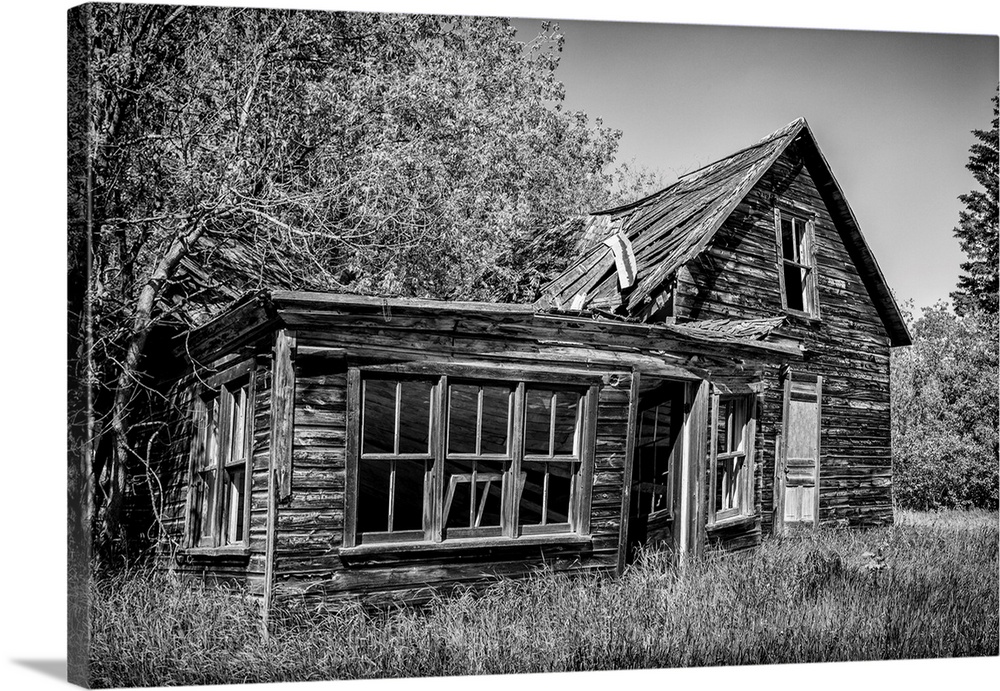Weathered wooden farmstead in the country, Winnipeg, Manitoba, Canada.
