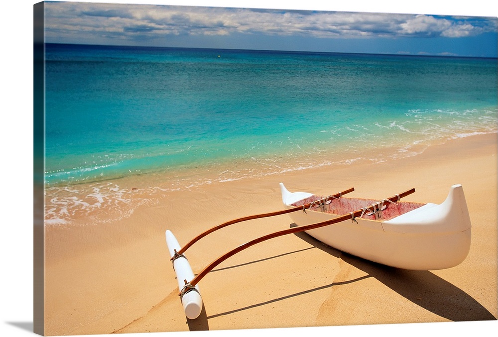 Horizontal canvas of a canoe sitting on a beach with crystal clear water washing ashore from the ocean.