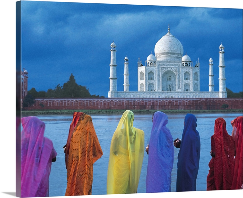 Women In Colorful Saris In Front Of The Taj Mahal; India
