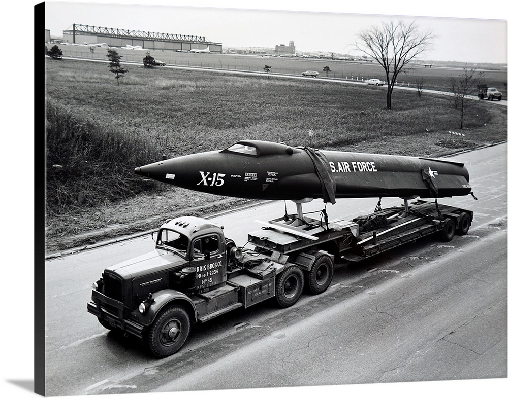 Photograph of the X15 research aircraft being trucked to Cleveland Public Auditorium for complete assembly and display dur...