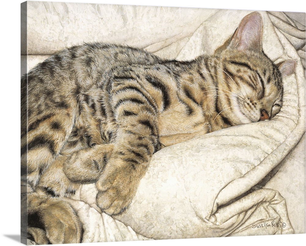 A striped bengal cat enjoying a nap on a soft blanket.