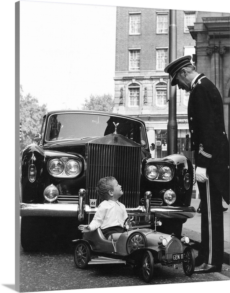 A young boy having parking trouble in London The toy car was one of the exhibits at the 7th London Toy Show