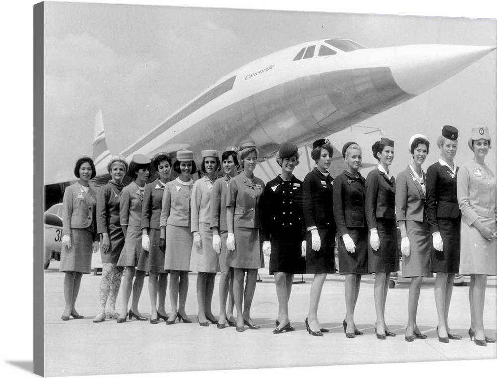 A line-up of some of the air stewardesses who attend to passengers on board 'Concorde', each one from a different airline ...