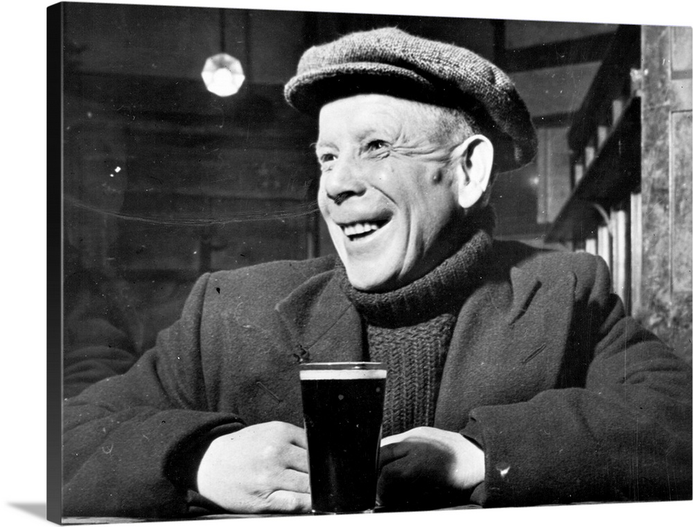 9th March 1946  A man enjoys a drink in a public house in the East End of London The area is about to be transformed by Lo...