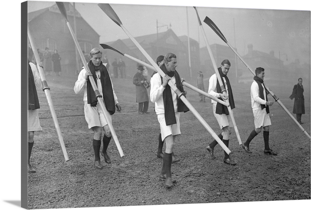 8th March 1938:  The Oxford University rowing crew leave the boat house at Putney during training for the university boat ...