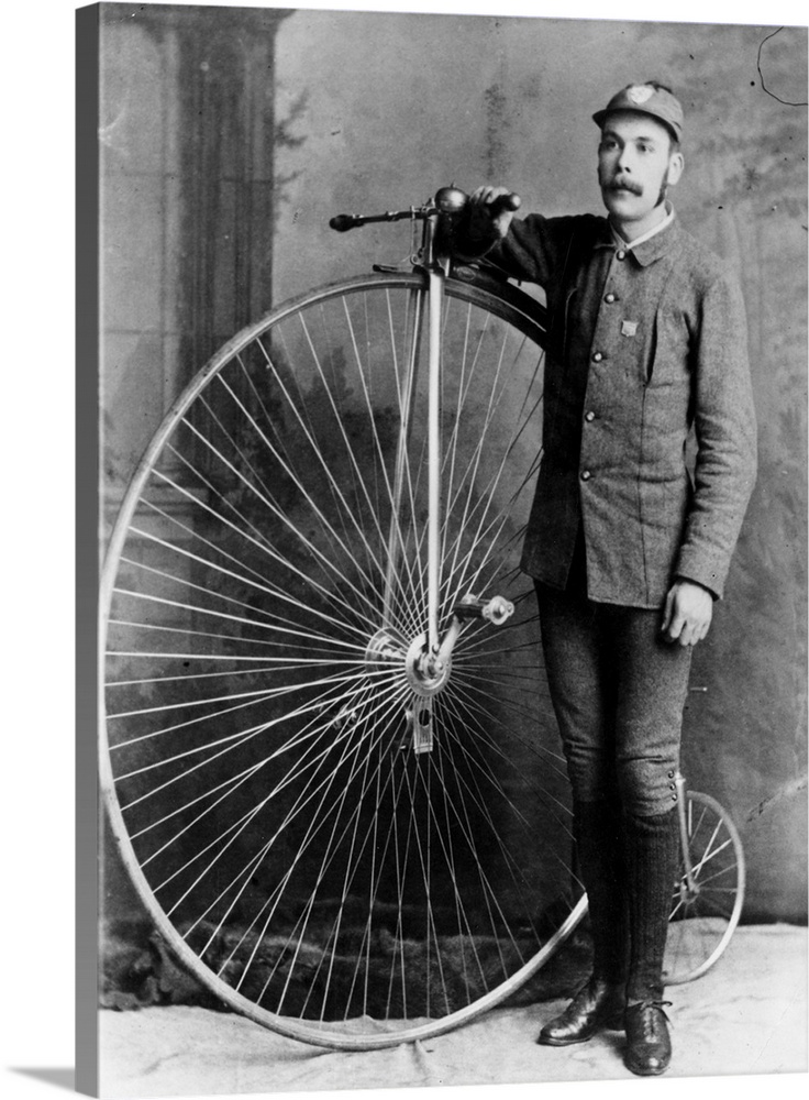 circa 1885:  H McDonald with his penny-farthing bicycle