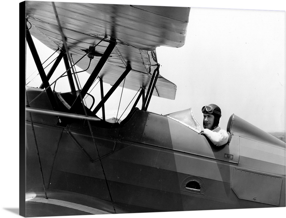 The film star Robert Montgomery, who is better known for riding, actually has a pilot's certificate and is pictured flying...