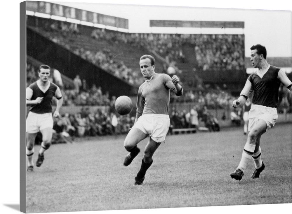 23rd May 1957:  Macek of Prague controls the ball during his team's game against West Ham United in Prague, Czechoslovakia