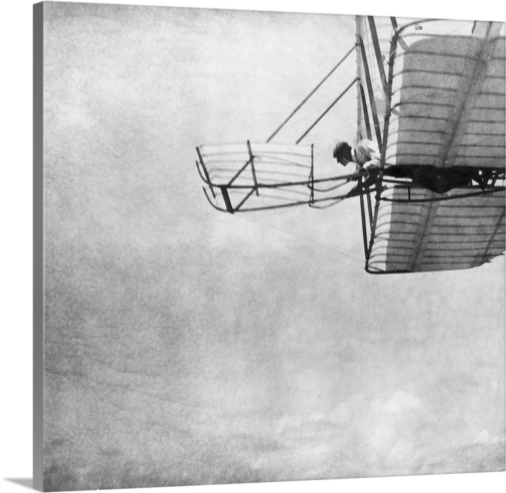 Wilbur Wright flying a 'Wright No 1' glider at Kill Devil Hills, near Kitty Hawk, North Carolina