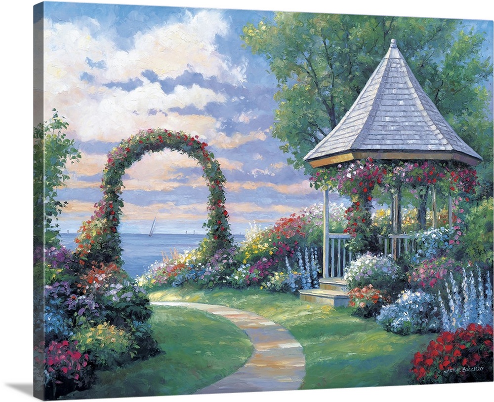 A gazebo along the walkway to the water with flowers surrounding it.