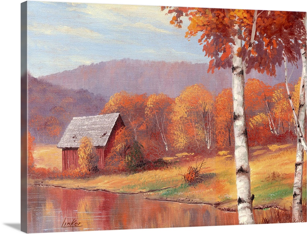 Shack by pond in front of mountain range and autumn birch trees.