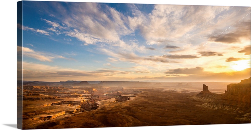 Landscape photograph of canyons at sunrise.
