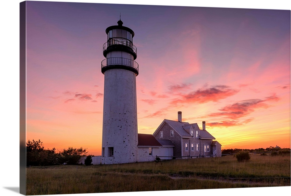 Photograph of the Cape Cod Highland Lighthouse at sunset.