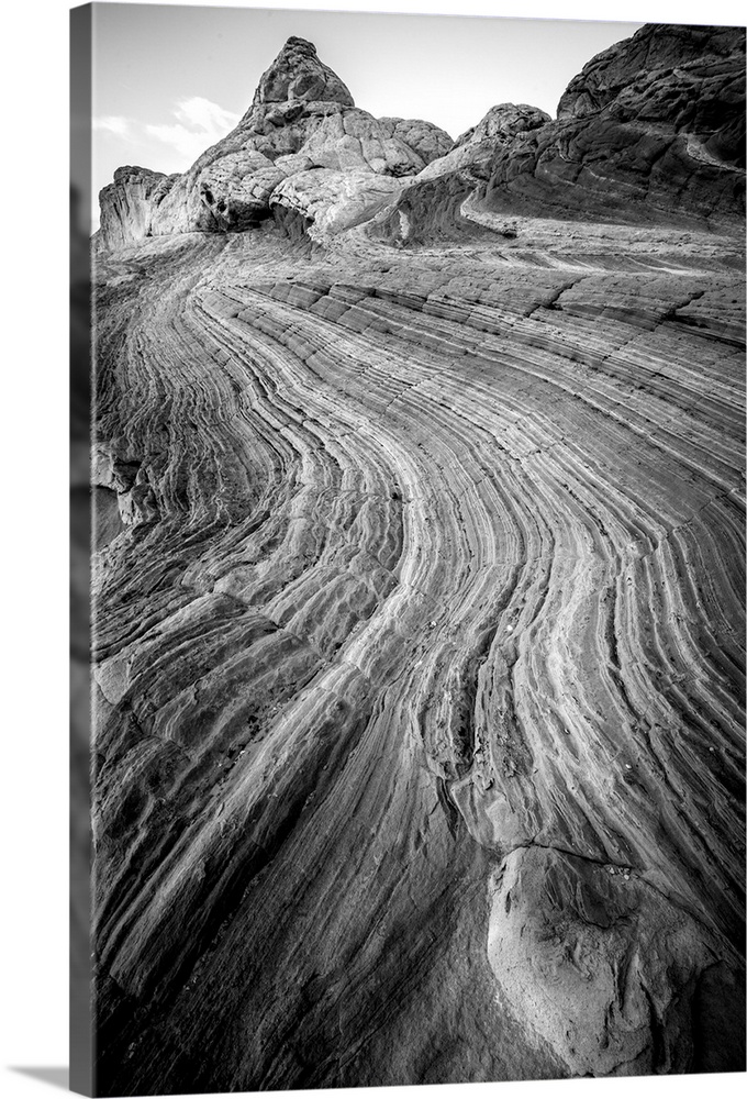 Black and white photograph highlighting the textures from the layers of rock.