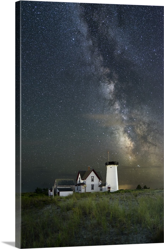 Photograph of Headless Tower Lighthouse (now a private residence) at night with the stars and Milky Way above, Massachusetts.