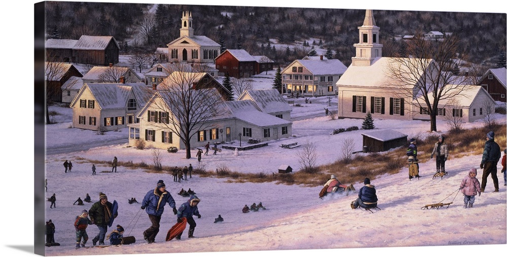 People enjoying sledding down the big hill, with the town in the distance.